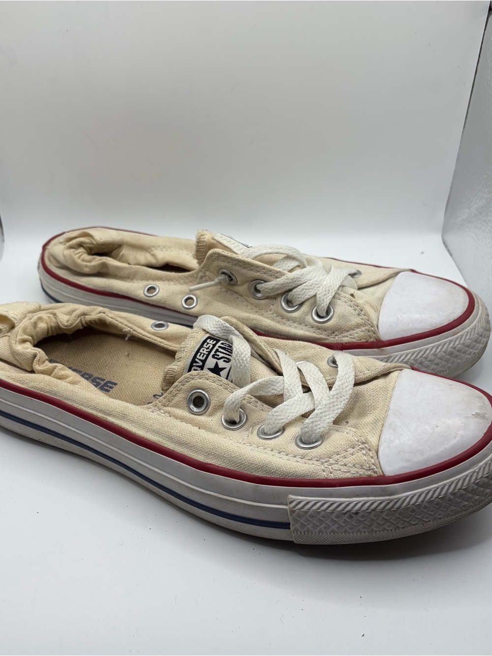 Converse Low-Top Canvas Sneakers in Cream with Red Trim